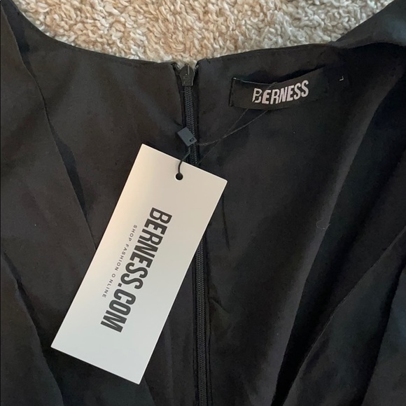 Black Blouse with Puff Sleeves and Hem Design - Picture 5 of 5